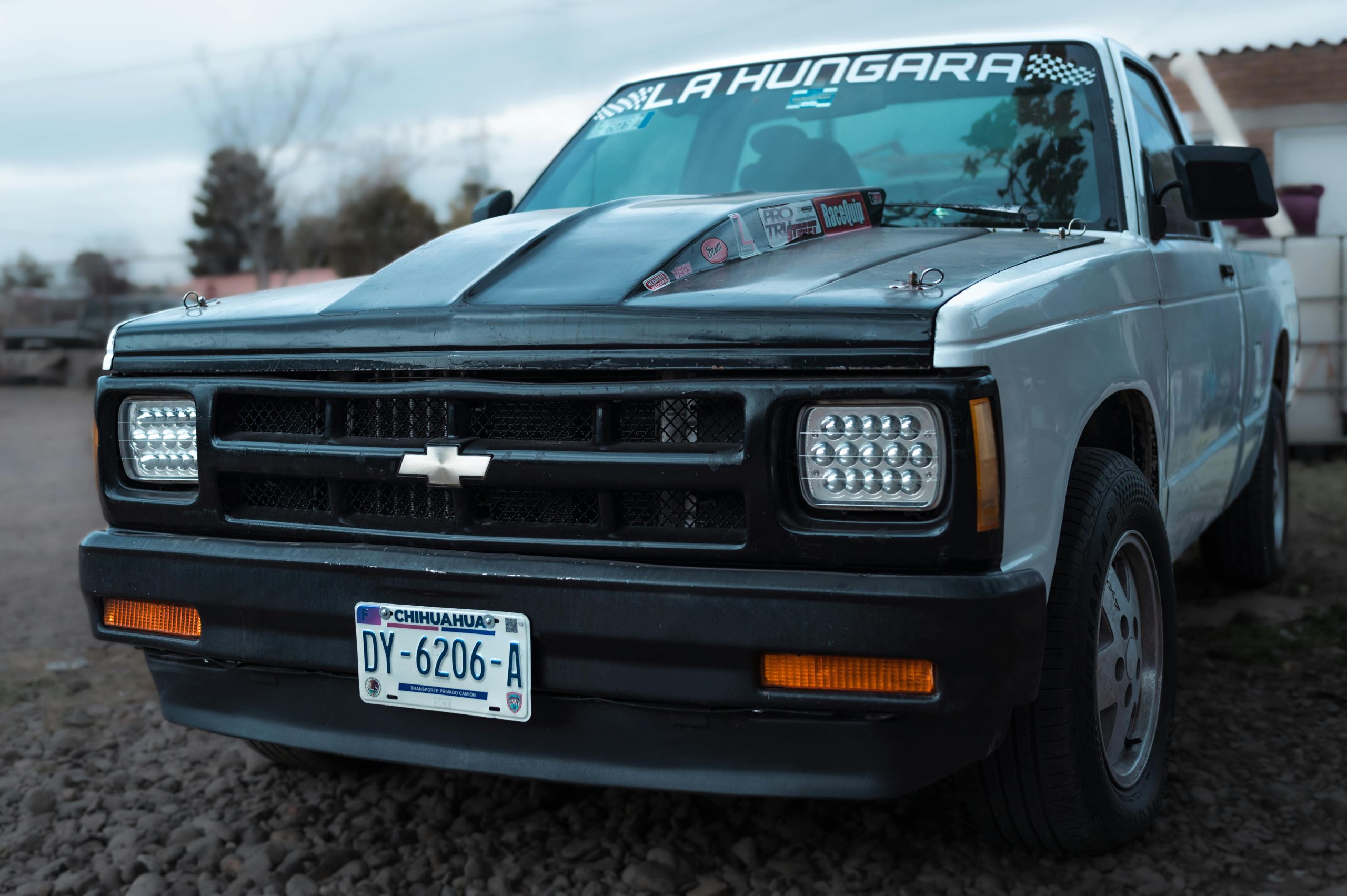 Front view of a classic white Chevrolet pick-up truck parked outdoors in Nuevo Casas Grandes, Chihuahua.